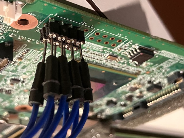 Jumper pins attached to BIOS chip